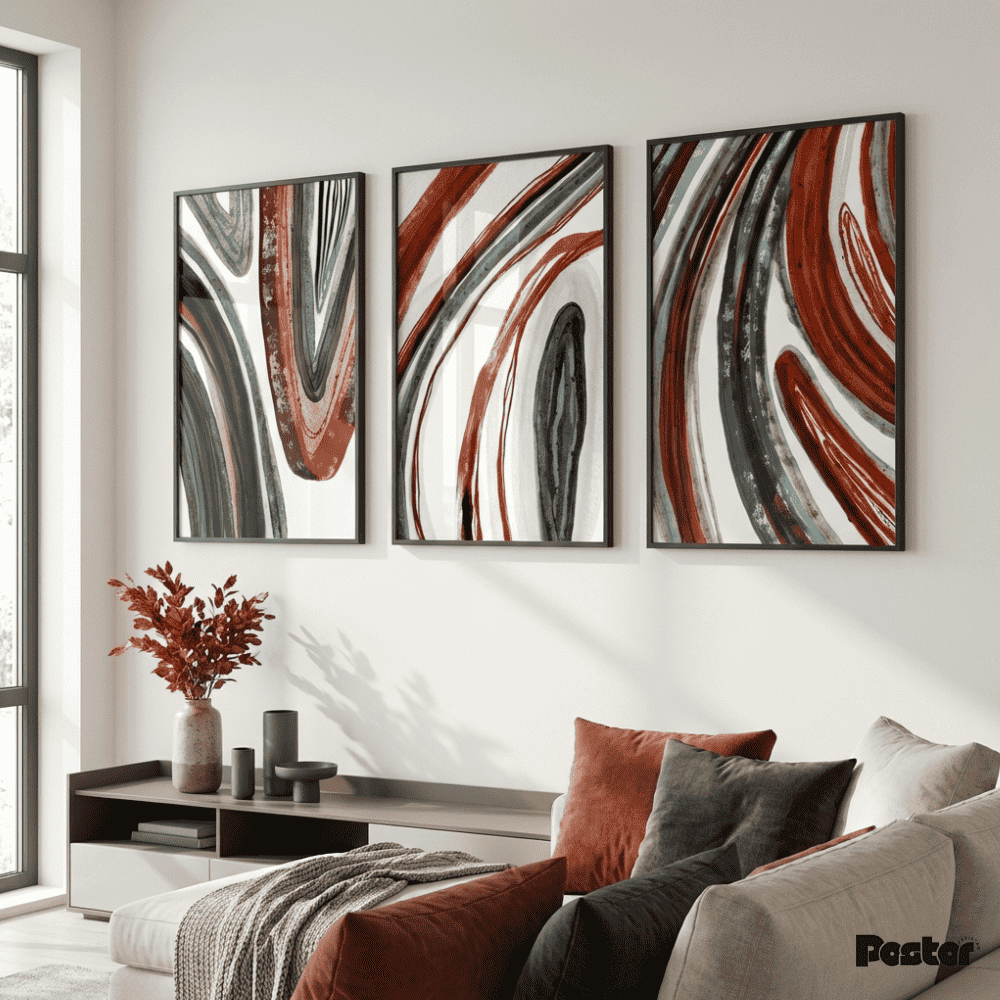 Three abstract wall art pieces in a living room setting.