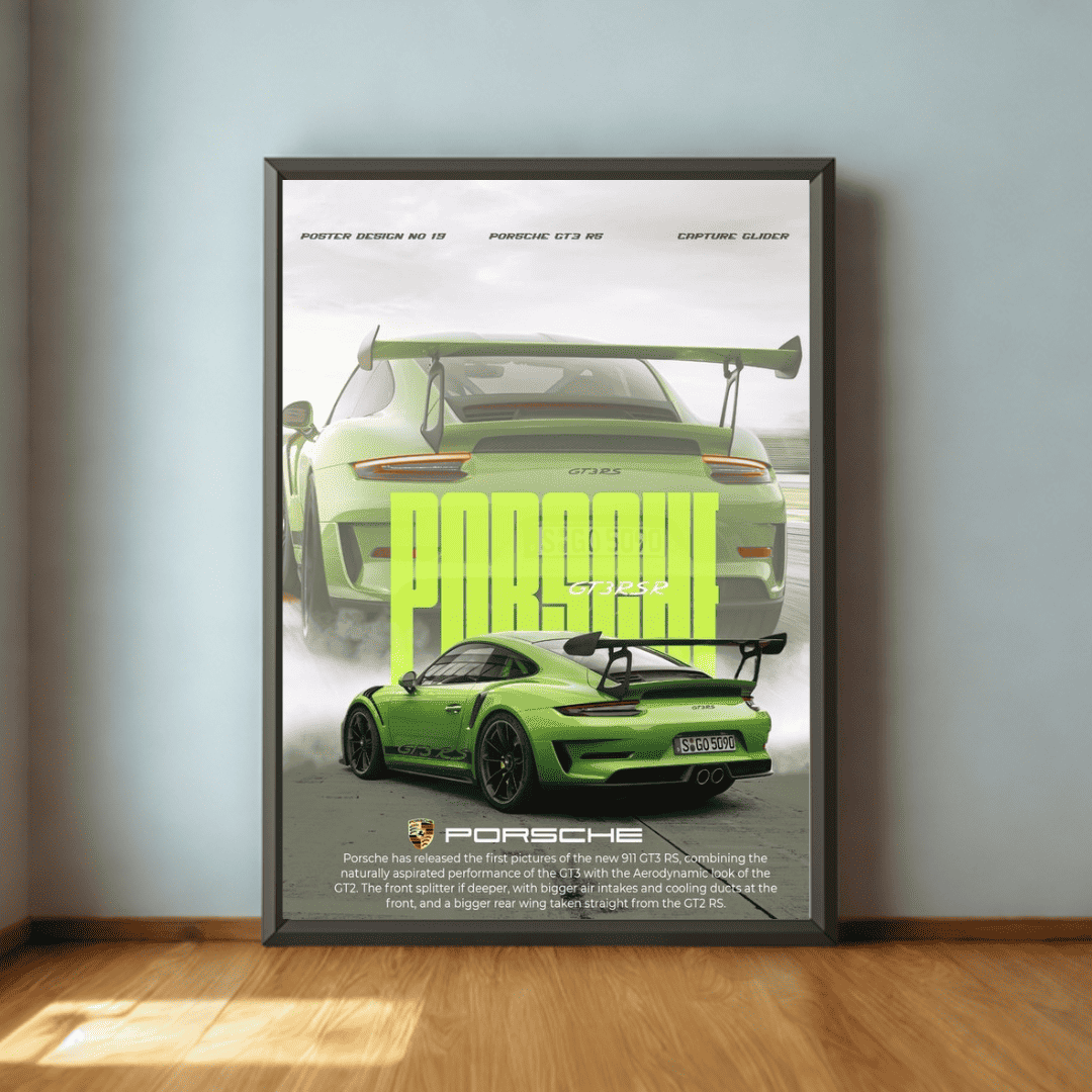 Framed poster of a green Porsche car on a wall.