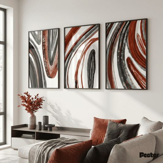 Three abstract wall art pieces in a living room setting.